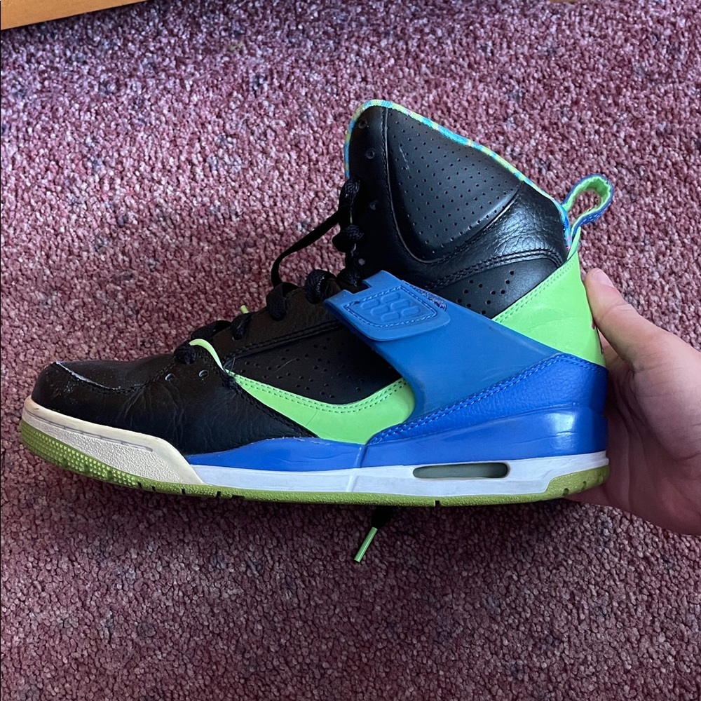 Nike Jordan’s Black and Blue High-Top Sneakers